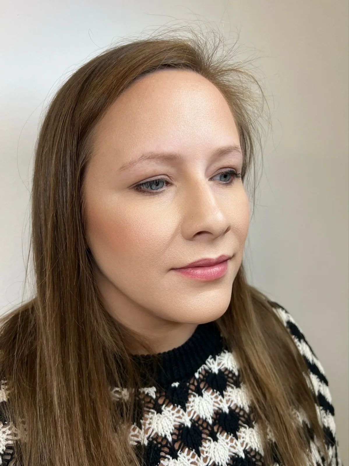 Natural-looking brow tattoo result on brunette client by Lorraine — defined feather brows, Gold Coast