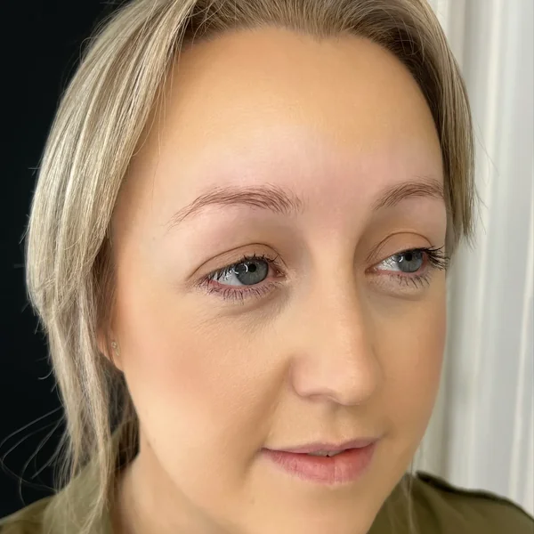 Sparse fine blonde eyebrows before microblading at Gold Coast clinic