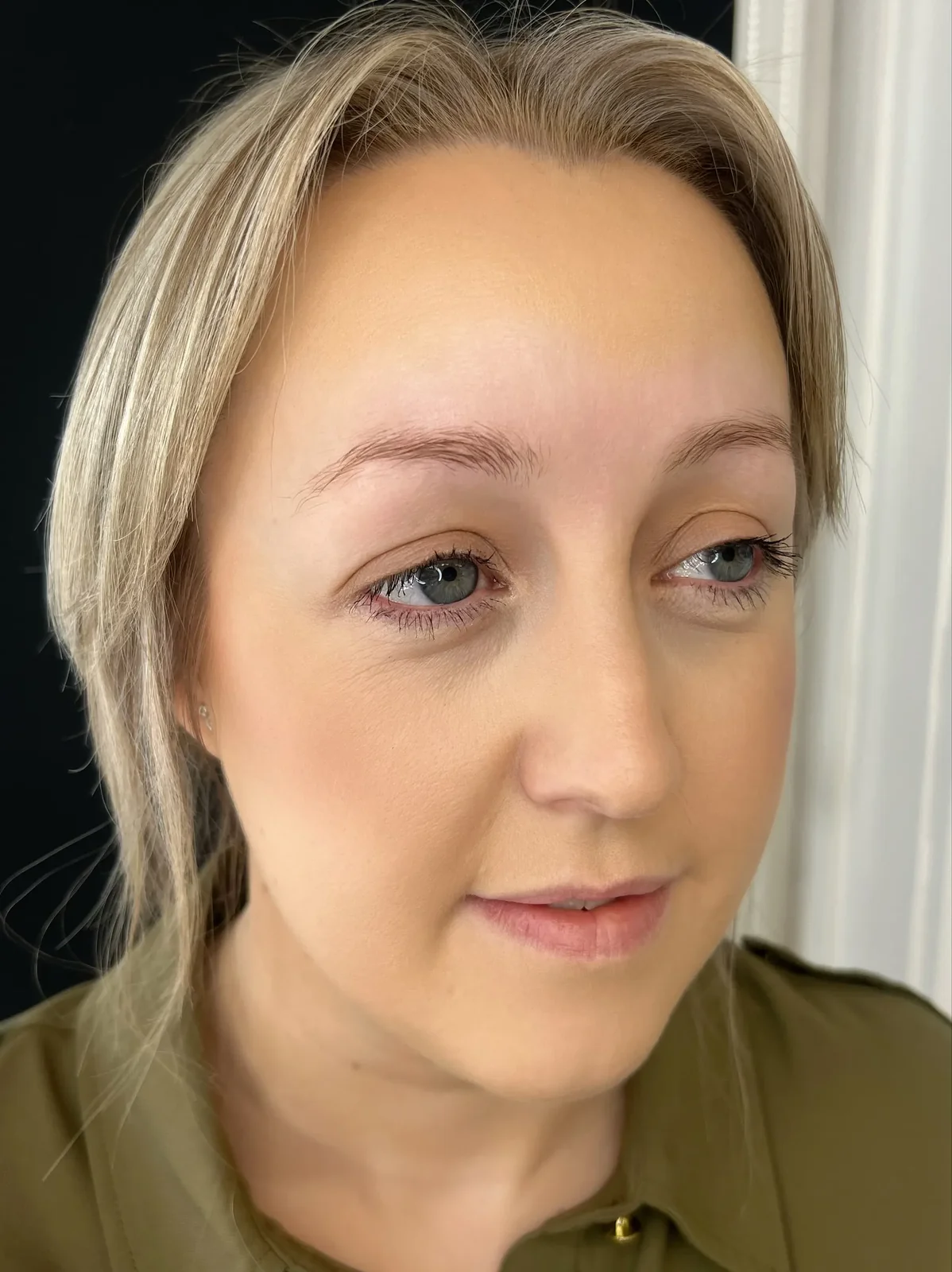 Sparse fine blonde eyebrows before 3D feather brow tattoo — a real client of Lorraine, Gold Coast