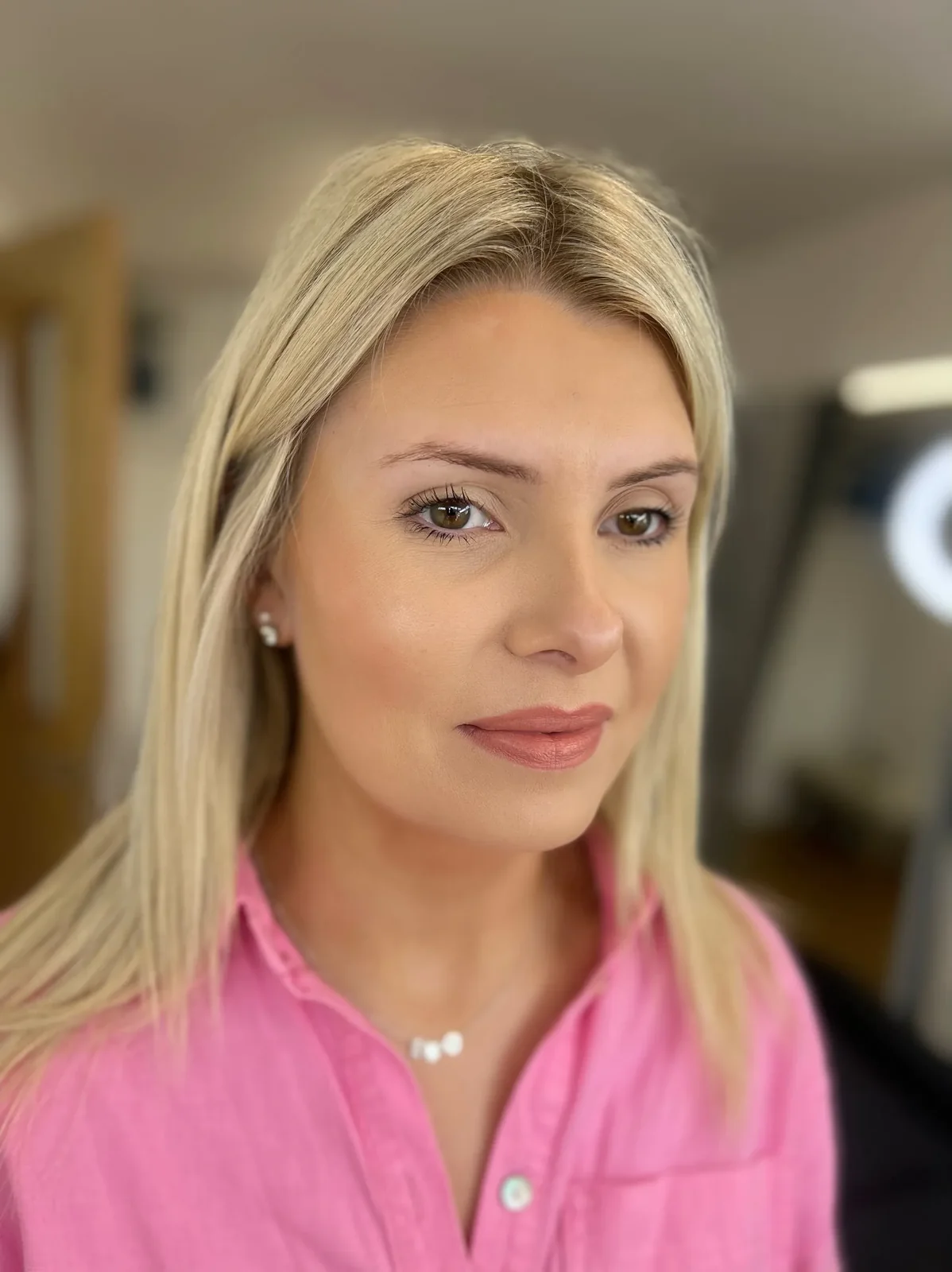 Uneven asymmetric blonde brows — a real client before brow balancing tattoo with Lorraine
