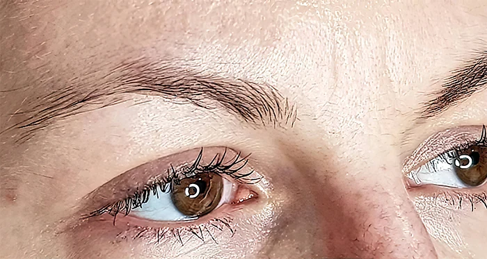 Before — 3D feather brow tattoo before and after — sparse, uneven brows transformed with hair-stroke pigment by Lorraine, Gold Coast