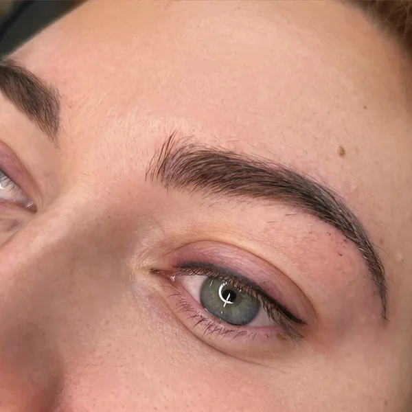 Mature lash line before eyeliner enhancement — sparse natural definition